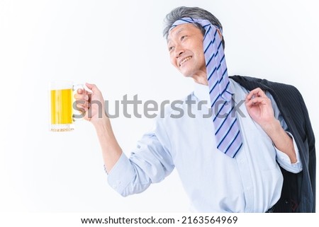 Elderly businessman who is too drunk Royalty-Free Stock Photo #2163564969