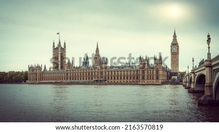 the british parliament building during sunset