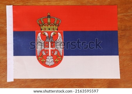 Serbia flag of silk with copyspace for your text or images and wood background-3D - Patriotic wooden background in colors of national flag. Serbia