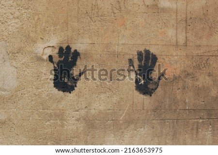 Painted hands in a pair. black hands. Graffiti

