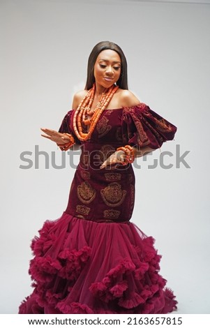 Portrait of happy African woman dressed in Igbo traditional attire Royalty-Free Stock Photo #2163657815