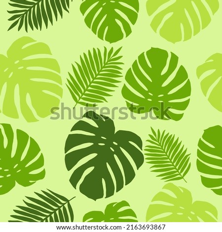 Green tropical leaves vector seamless pattern.