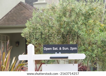 close up on Open House sign for home. First-time home buyers in California have a more difficult time affording property than do first-time buyers in other states.