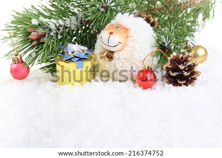 New Year composition with a sheep - a symbol of 2015 on east calendar, on a white background. space for text.