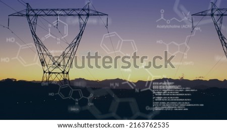 Digital image of chemical structures and program codes appearing in the screen. Background shows transmission towers in a field during sunset.