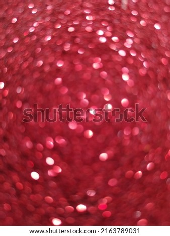 Gorgeous red glitter background texture.