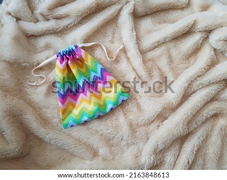 Little drawstring pouch with zigzag chevron rainbow colors motif