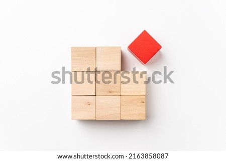 leadership, abstract, cooperation concept with red wood cube isolated on white background, for mock up, top view layout. Royalty-Free Stock Photo #2163858087