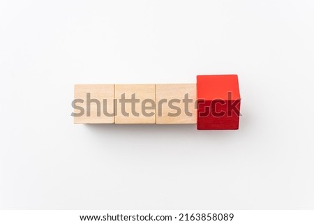leadership, abstract, cooperation concept with red wood cube isolated on white background, for mock up, top view layout. Royalty-Free Stock Photo #2163858089