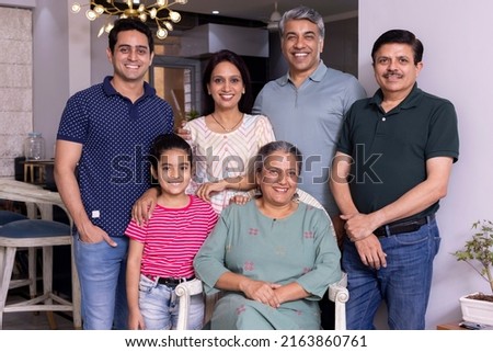 Portrait of multi generation Indian family at home
