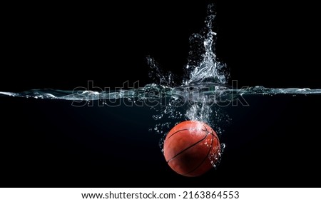 basketball dropping in the water