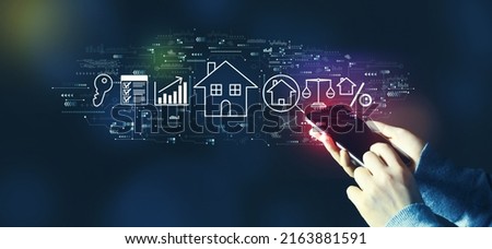 Real estate theme with person using a smartphone