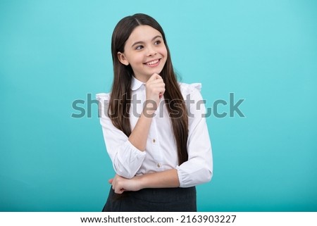 Beautiful teenager child 12, 13, 14 years old over isolated background with hand on chin thinking about question, thoughtful face. Doubt concept. Royalty-Free Stock Photo #2163903227