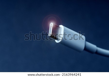 USB type-c cable close up. Royalty-Free Stock Photo #2163964241