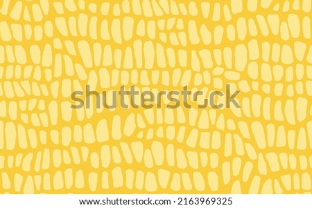 Abstract modern crocodile leather seamless pattern. Animals trendy background. Yellow decorative vector illustration for print, fabric, textile. Modern ornament of stylized alligator skin.