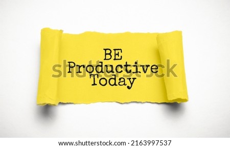 torn paper with the inscription - BE PRODUCTIVE TODAY