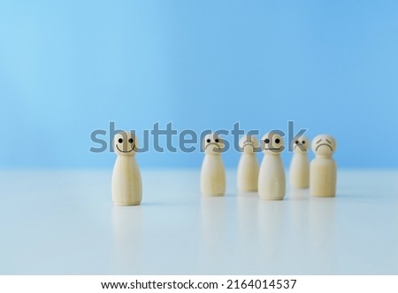 Happy or cheerful wooden doll with smile facial expression. Concept of positive thinking energy, good mind or mindset and optimistic. Self love or wellbeing conceptual Royalty-Free Stock Photo #2164014537