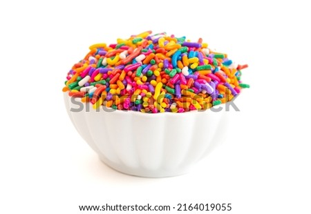 Bright Rainbow Sprinkles Isolated on a White Background Royalty-Free Stock Photo #2164019055
