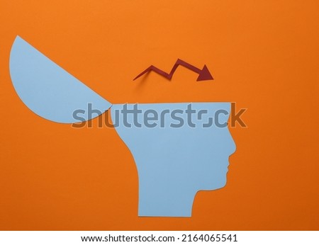 Open your mind, mental health concept, creative thinking. Paper silhouette of human head with drop arrow on orange background