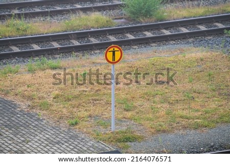 Traffic signs in a railway train station showing that the access of people here is forbidden. Transportation industry.