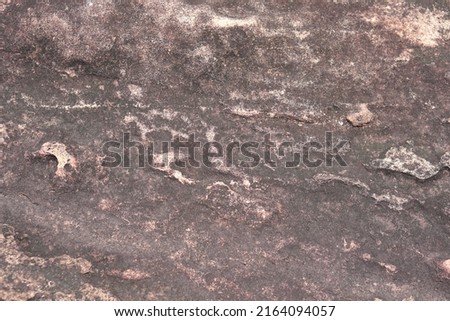 stone background was eroded by the wind creating a beautiful pattern. marble background with text
