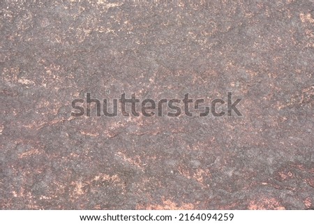 stone background was eroded by the wind creating a beautiful pattern. marble background with text