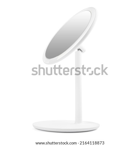 Makeup mirror isolated on white background. White illuminated mirror isolated on a white background. Desktop mirror for make-up.