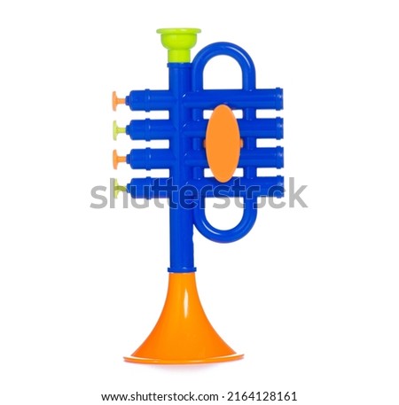 Kids toy musical instrument trumpet on white background isolation