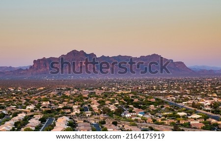 Landscape photograph taken at sunset from Brown Mountain looking at the Superstition Mountains in Mesa, Arizona. Royalty-Free Stock Photo #2164175919