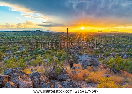 Landscape photograph taken from north Mesa, Arizona looking towards Phoenix, Arizona at sunset. Royalty-Free Stock Photo #2164179649