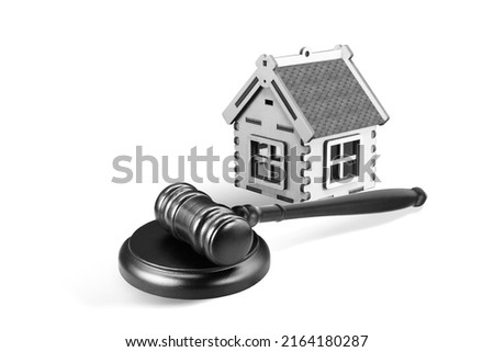 Abstract photo with wooden gavel and abstract house isolated on white background as symbol of sale of mortgage or emergency housing at auction or as symbol of legal dispute over division of real estat