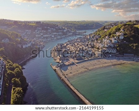 Aerial drone shot of Looe, picturesque seaside village in Cornwall, South west England, United Kingdom. Royalty-Free Stock Photo #2164199155