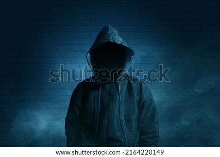 guy in black hoodie themed hacker