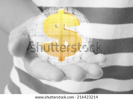 Man's hand holding Golden dollar simbol 