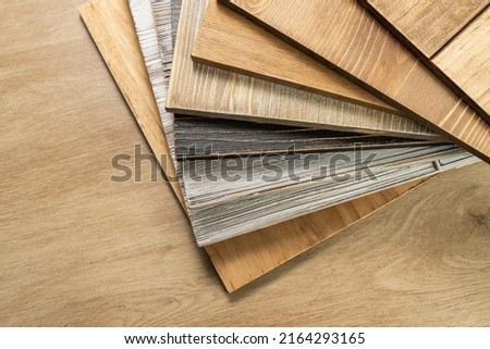 Stack of various construction sample wood boards. Royalty-Free Stock Photo #2164293165