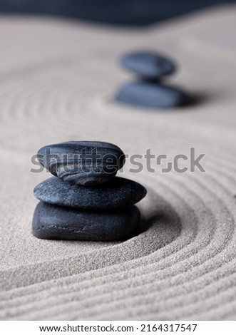 Zen garden japanese garden zen stone with zen pattern in sand as background