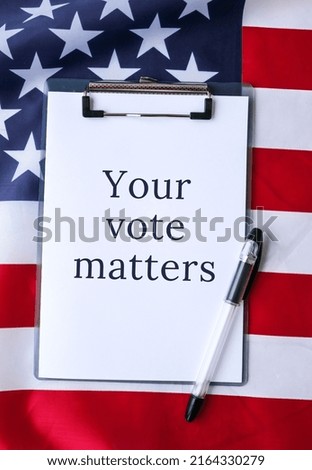 The National Flag of the United states of America. American Flag with paper note message text. Election day, give vote, your vote matters counts, vote is voice. Be responsible. Voting government