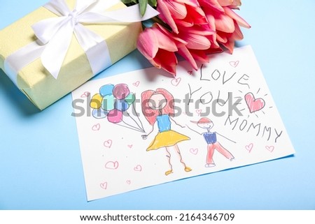 Picture with text LOVE YOU MOMMY, tulips and gift box on blue background