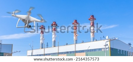Drone Scanning of defects on pipe surface. Banner Industry control and inspection chimneys of gas oil turbo power plant, selective focus.