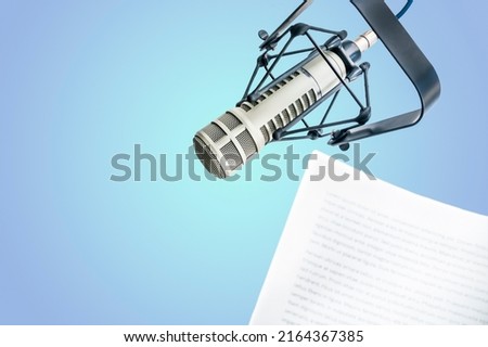Background: Professional microphone,and text on paper