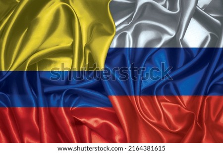 Colombia and Russian two folded silk flags together