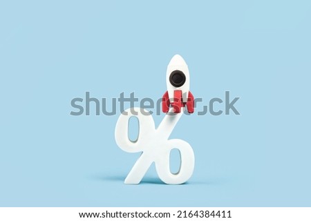 Financial growth concept. Rocket on percentage sign