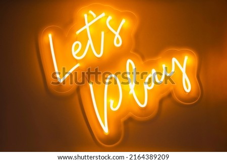 Let's Play Type font Neon sign light Signage on wall