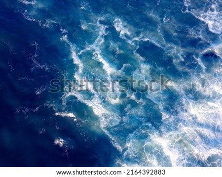 Aerial over waves in the ocean