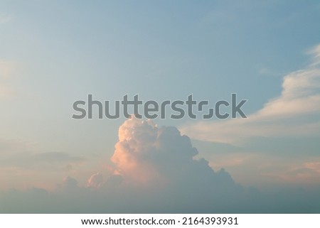 the sky is blue with reddish clouds at sunset
 Royalty-Free Stock Photo #2164393931