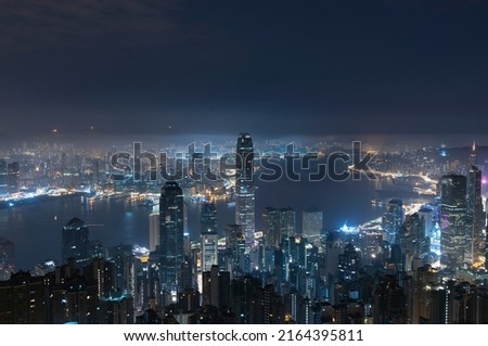 Night scenery of Victoria harbor of Hong Kong city before dawn