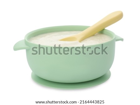 Healthy baby food in bowl on white background Royalty-Free Stock Photo #2164443825