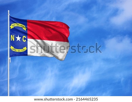 National flag of State of North Carolina on a flagpole