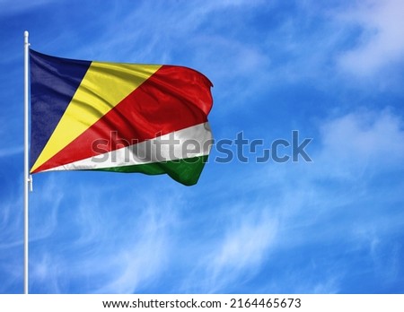 National flag of Seychelles on a flagpole