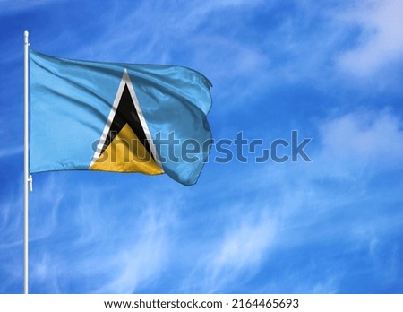 National flag of Saint Lucia on a flagpole
